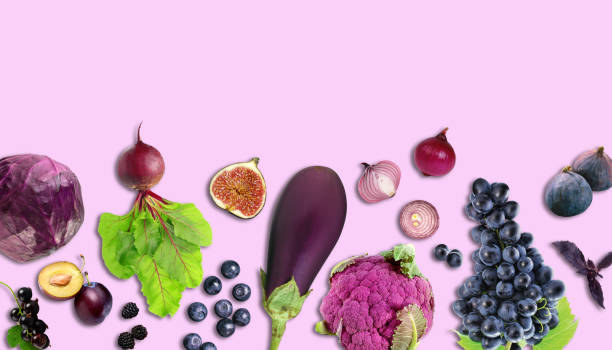 istock Creative layout made of red cabbage, eggplant, onion, basil, fig, cauliflower, blueberry, plum, grape, beetroot, blackberry on the purple background. 1438572627