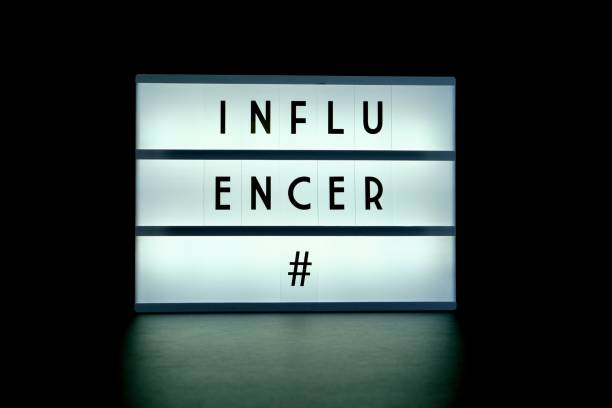 istock Display device with the word influencer and a hashtag sign 1438573464