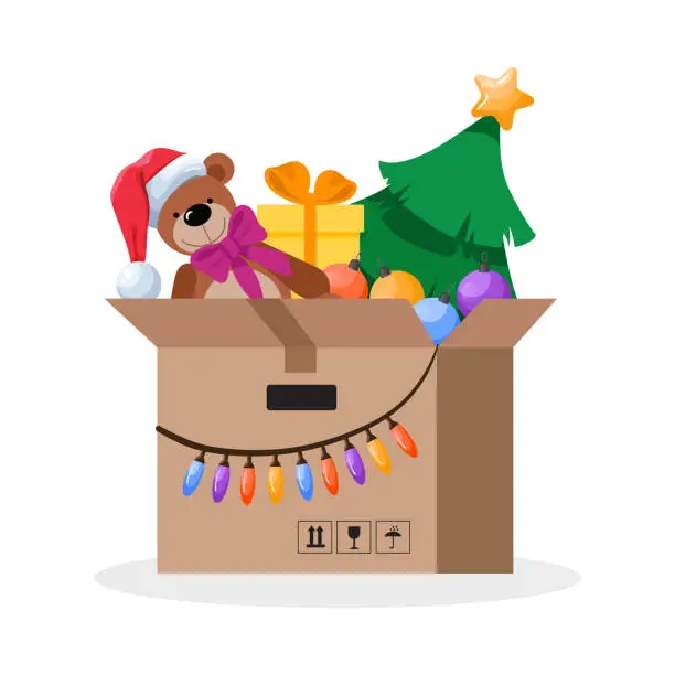 Vector illustration of christmas toys in a cardboard box. vector illustration in cartoon style.
