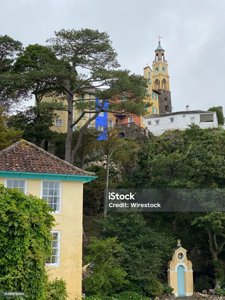 Vertical shot of the buildings of Portmeirion tourist village in Gwynedd, North Wales, UK A vertical shot of the buildings of Portmeirion tourist village in Gwynedd, North Wales, UK Architecture Stock Photo