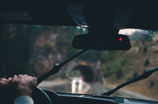 istock View from the car interior during a heavy rain 1438579315