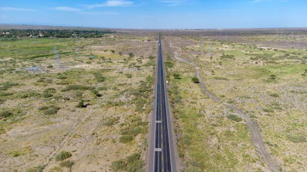istock Aerial view of a highway going through the fields 1438582190