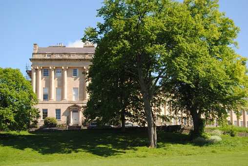 Bath, England., United Kingdom – July 21, 2019: The Royal Crescent, Bath, Somerset, England. July  21, 2019.  Designed by John Wood the Younger and built between 1767-74.