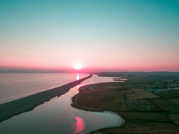 istock Sunset over the Fleet in Weymouth, Dorset, UK 1438583566