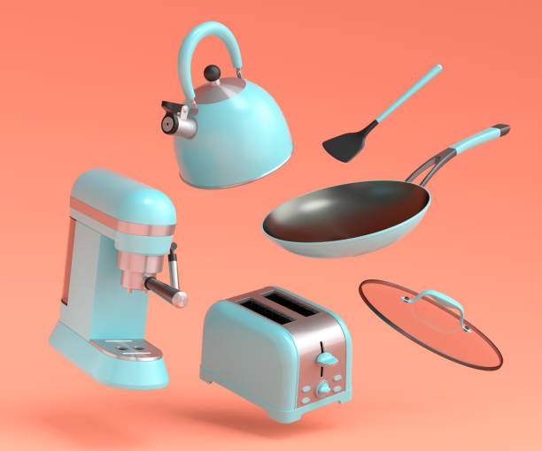 Espresso coffee machine, hand mixer, kettle and toaster on coral background. stock photo