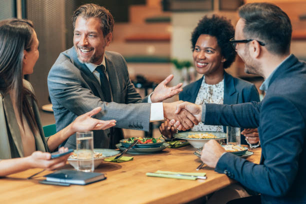 istock Business handshake at the restaurant 1438586984