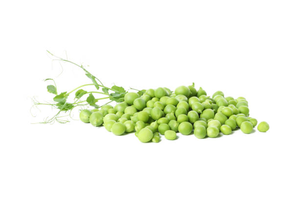 istock Green pea seeds isolated on white background 1438588128
