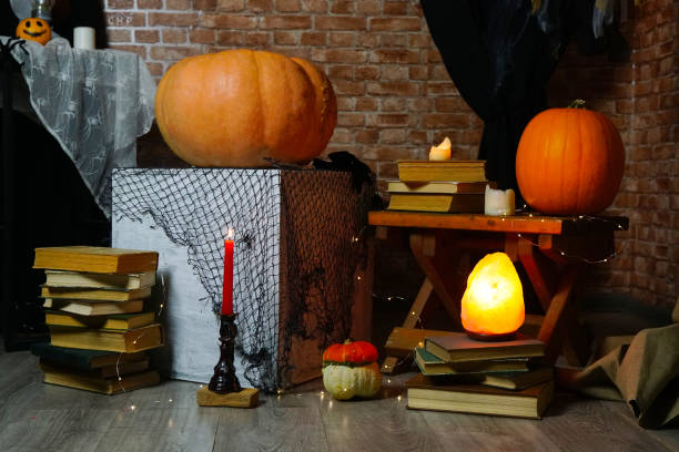 istock Interior of hall decorated for Halloween with table and rack 1438588329