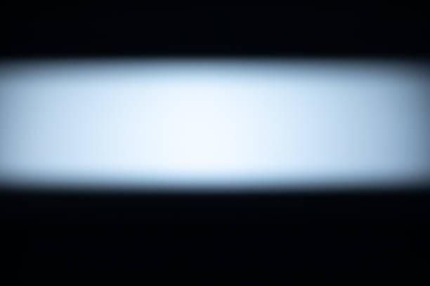 Studio backdrop wallpaper inside room wall light against black background and empty space. Abstract dark bright spotlight line with copy space background in middle