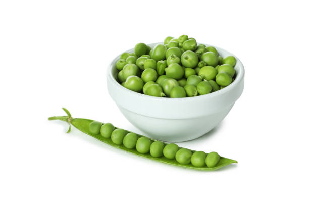 istock Fresh green pea isolated on white background 1438588975