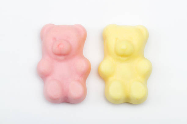 istock Pink and yellow candy bears couple 1438589606
