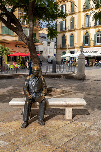 Malaga, Spain - October 26, 2022: Bronze statue of Pablo Picasso in Malaga, Spain on October 26, 2022