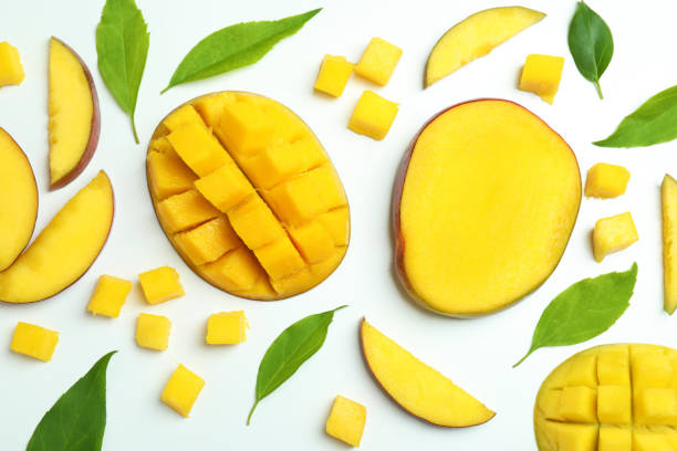 istock Ripe mango fruits on white background, top view 1438592093