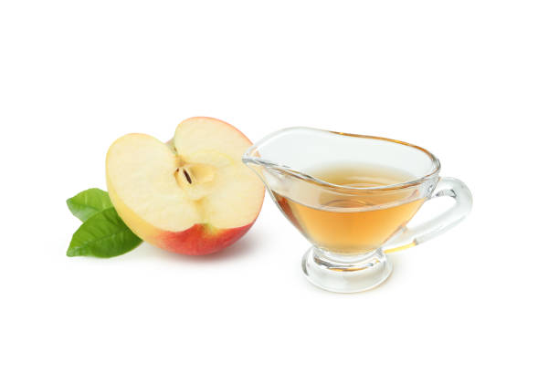 istock Homemade apple vinegar isolated on white background 1438593109
