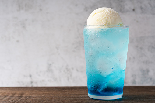 blue soda float with vanilla ice cream drink