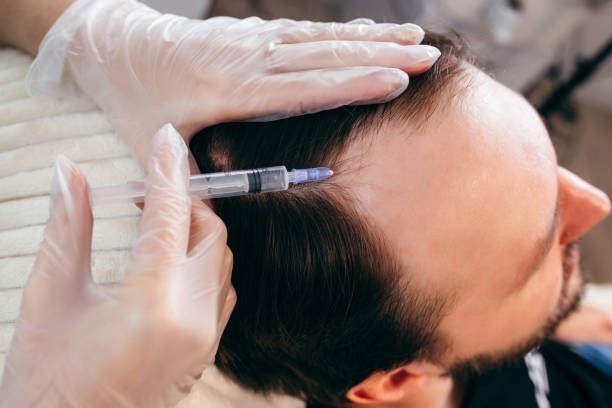 istock Young man receiving injection, close up 1438597294