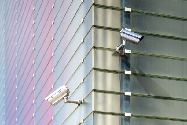 istock Surveillance Cameras On Glass Facade 1438600935