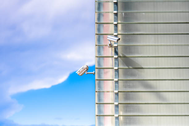 istock Surveillance Cameras On Glass Facade 1438601500