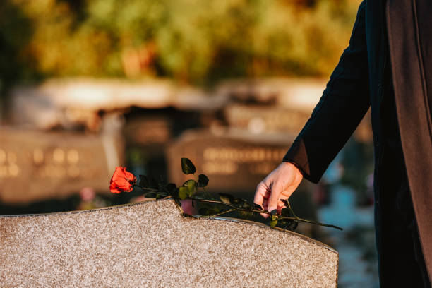 istock Man in the cemetery 1438602191