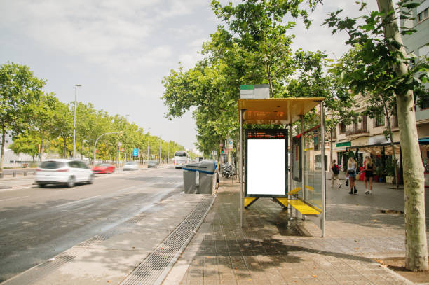 istock Bus stop with a blank advertisement poster 1438605298