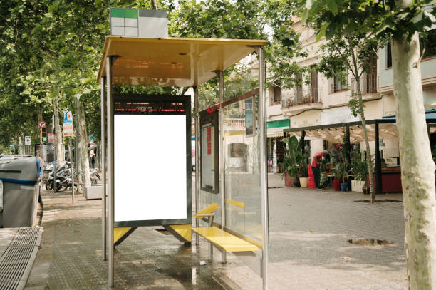 istock Bus stop with a blank advertisement poster 1438605360