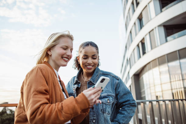 istock Young women in the city using smart phone 1438605517