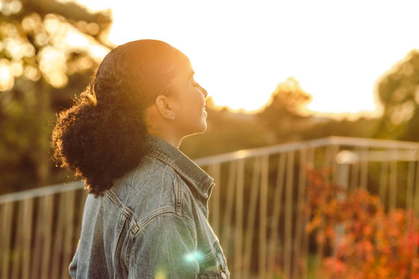 istock Young woman looking at the view and relaxing 1438606968
