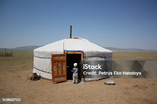 istock A boy in front a nomadic tent (ger), Atar sum in Tuv province, Mongolia. 1438607132