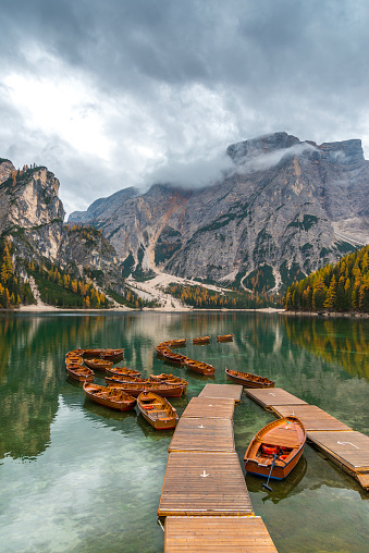 Beautiful lake in the italian alps, Lago di Braies with wooden row boats