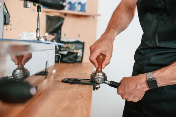 istock Preparing coffee by special tool. Barista in the cafe. Close up view 1438608636