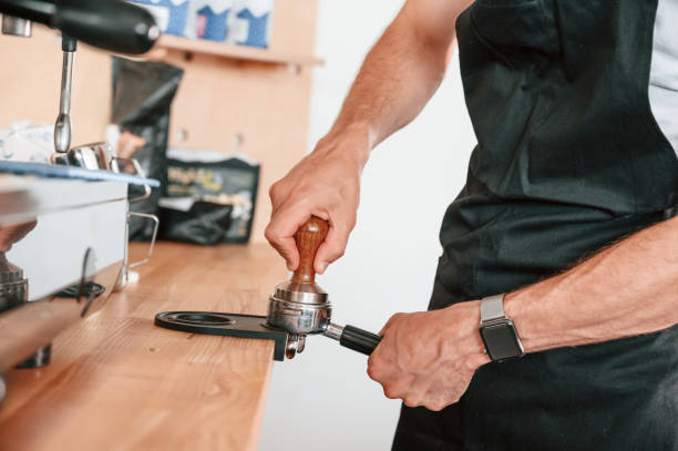 istock Preparing coffee by special tool. Barista in the cafe. Close up view 1438608640