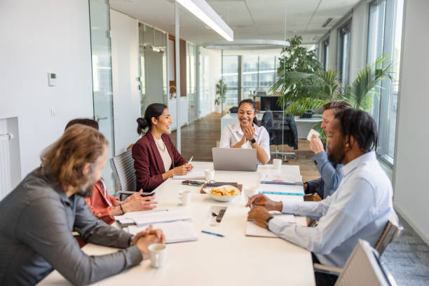 istock Meeting In The Conference Room A Multicultural Co-workers 1438610682