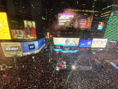 New York, United States – December 31, 2019: Thousands of people waiting for a Ball Drop in NYC, Times Square.
Thousands of NYPD crafts mobilized. Stars incl. Post Malone, BTS, Ryan Seacrest.