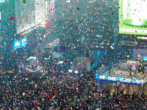 New York, United States – December 31, 2019: Thousands of people waiting for a Ball Drop in NYC, Times Square.
Thousands of NYPD crafts mobilized. Stars incl. Post Malone, BTS, Ryan Seacrest.