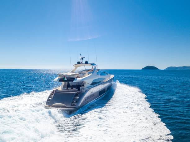 istock Yacht sailing on the sea under a clear blue sky 1438612780