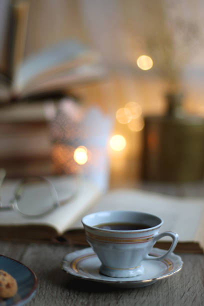 istock Cookies, Tea, Books and Candle 1438613065