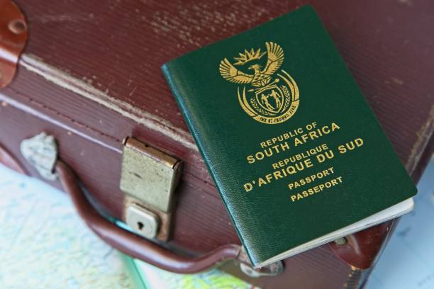 istock High angle shot of a passport on a leather suitcase and a geographical map 1438613672