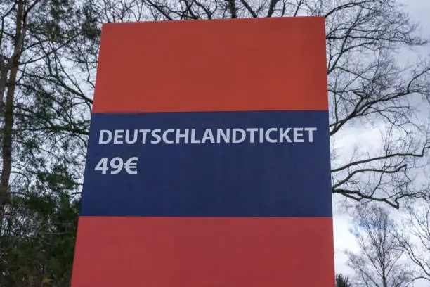 Sign shows "Deutschlandticket 49€" which means train ticket for germany for just 49€