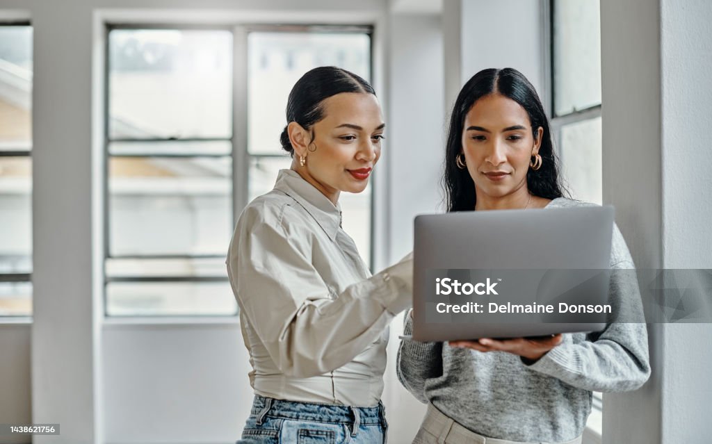 Laptop, women and digital marketing employees on a blog website working on cool trendy online fashion content. Branding, teamwork and social media page editors researching current trendy post ideas Laptop Stock Photo
