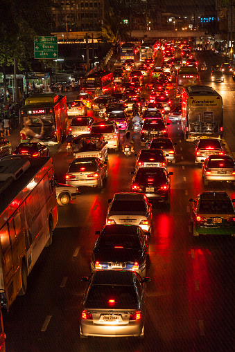 Bangkok, Thailand - May 6, 2009:  heavy traffic at Main Road in Bangkok at night  in Bangkok, Thailand.  It is already one of the world's most polluted cities and pollution by car emissions is one main reason.