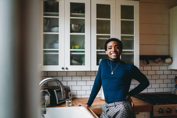 istock Portrait of a non-binary person in the kitchen 1438625718