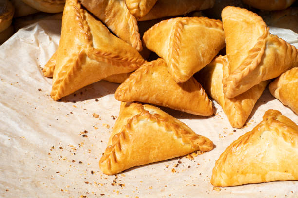istock Triangular Tatar pie echpochmak stuffed with potatoes and meat, national Tatar pastry 1438630434