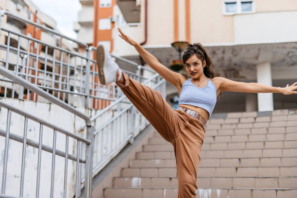 istock Young Woman Dancing Outdoors 1438633117