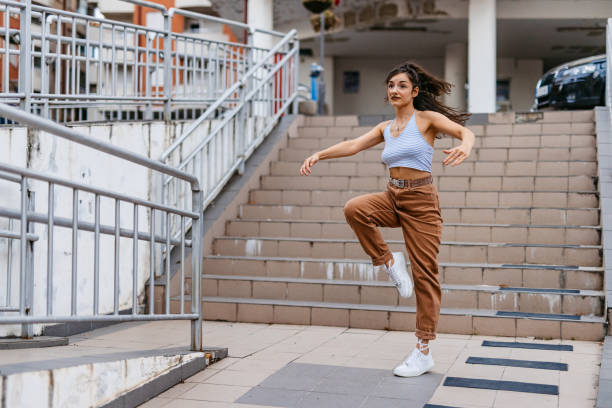 istock Young Woman Dancing Outdoors 1438633234