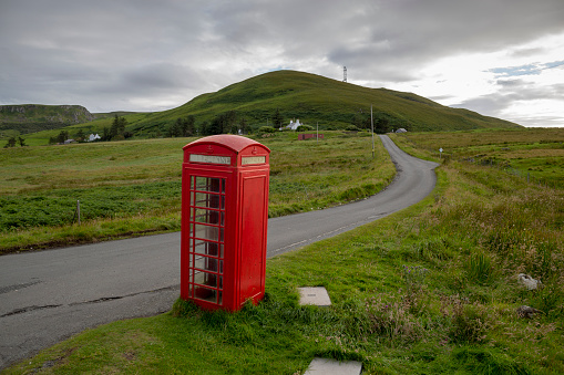 English phone booth in a village on the north of the Isle of Skye in the Scottish Highlands