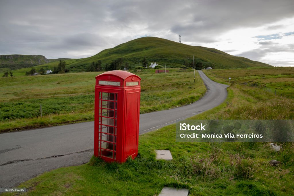 English phone booth in a village on the north of the Isle of Skye in the Scottish Highlands Old Stock Photo