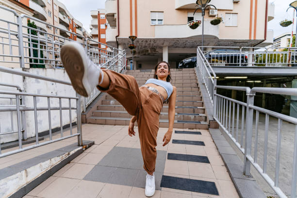 Young Woman Dancing Outdoors