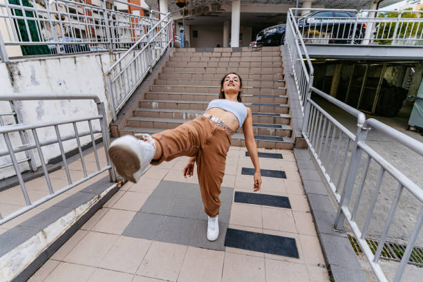 istock Young Woman Dancing Outdoors 1438633600