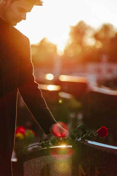 istock Man in the cemetery 1438634835