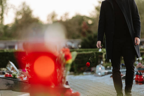 istock Man in the cemetery 1438635789